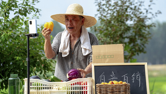 中国邮政为何爱上了“卖菜送菜”？
